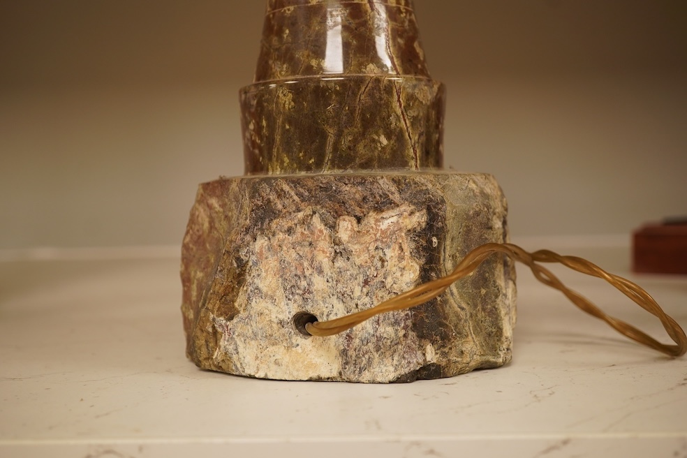 A serpentine lamp modelled as a lighthouse, 34cm high